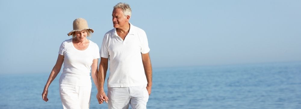 Couple holding hands for our 8 steps online dating tips