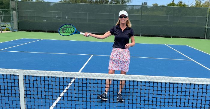 Karen playing tennis/blog post why women are prone to falls after 50